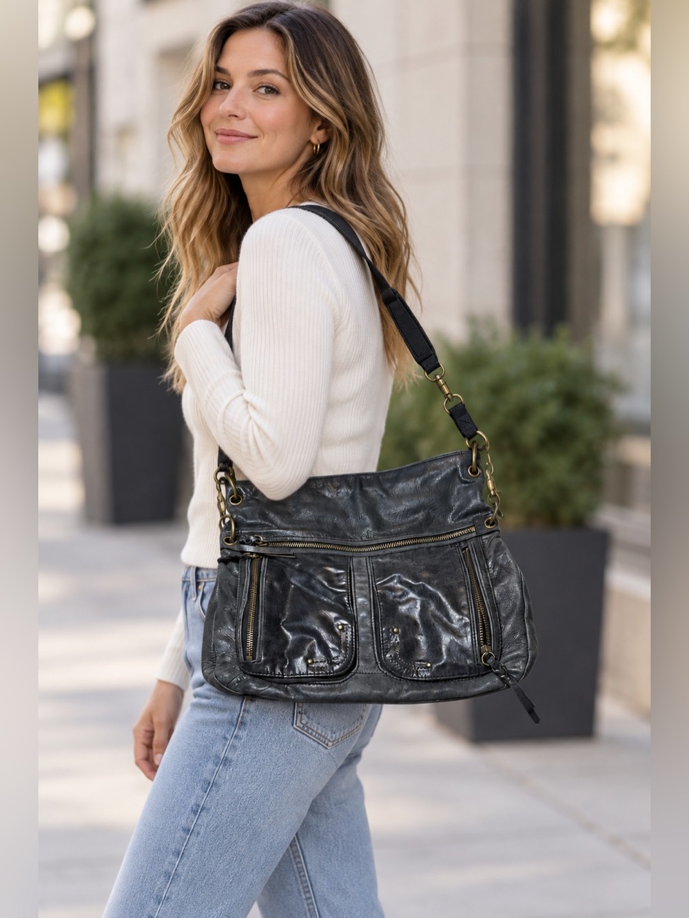 The Sak Black Leather Multi Pocket Convertible Shoulder Crossbody Bag